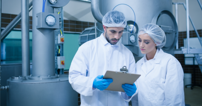 Lab Workers Analyzing Results From An Experiment