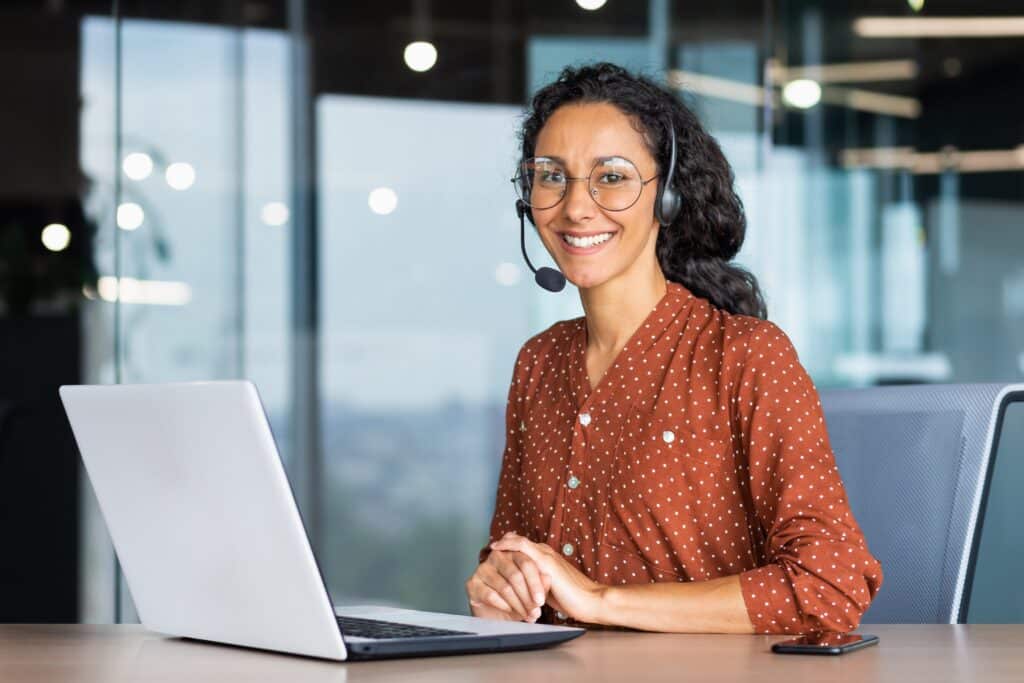 Portrait,of,latin,american,business,woman,,office,worker,looking,at, call out process worker